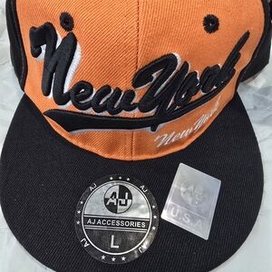 NWT! 2 SET!New York Cap Set - AJ Accessories. Orange Black, Purple/yellow